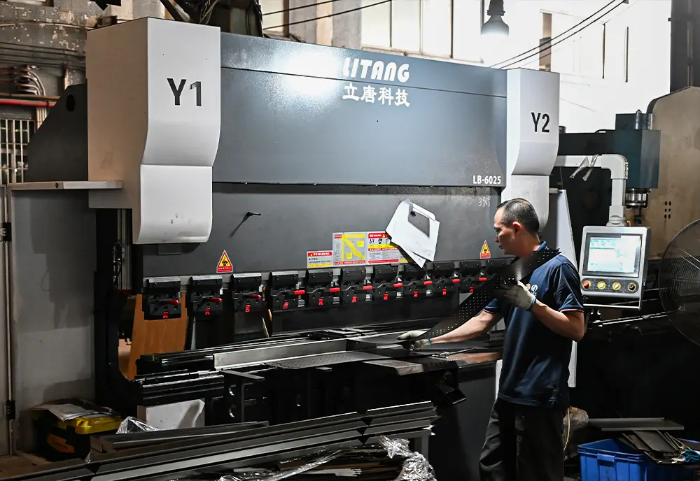Laser cutting machine for rack components